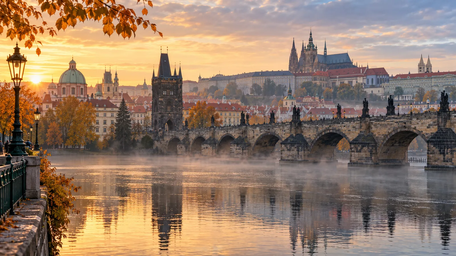 Charles Bridge and Prague Castle in morning mist