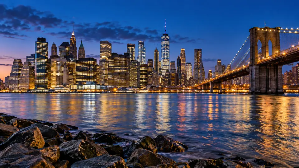 Manhattan skyline and Brooklyn Bridge at blue hour