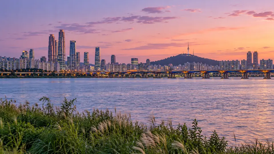 Seoul skyline across the Han River at dusk