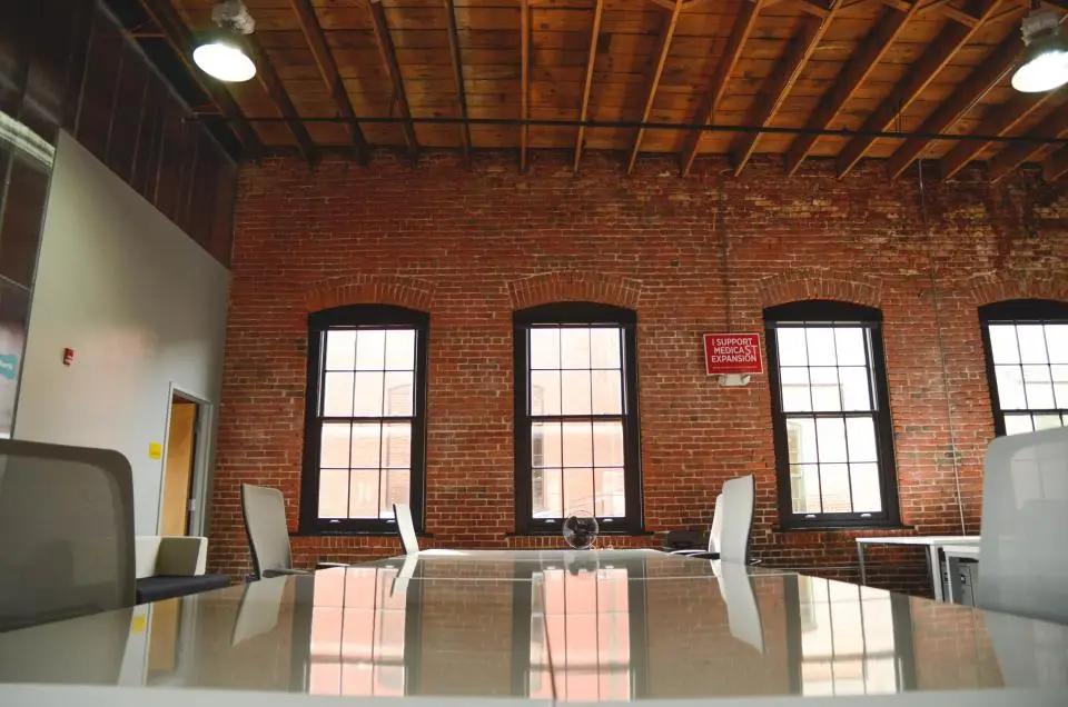 Empty conference room with brick walls